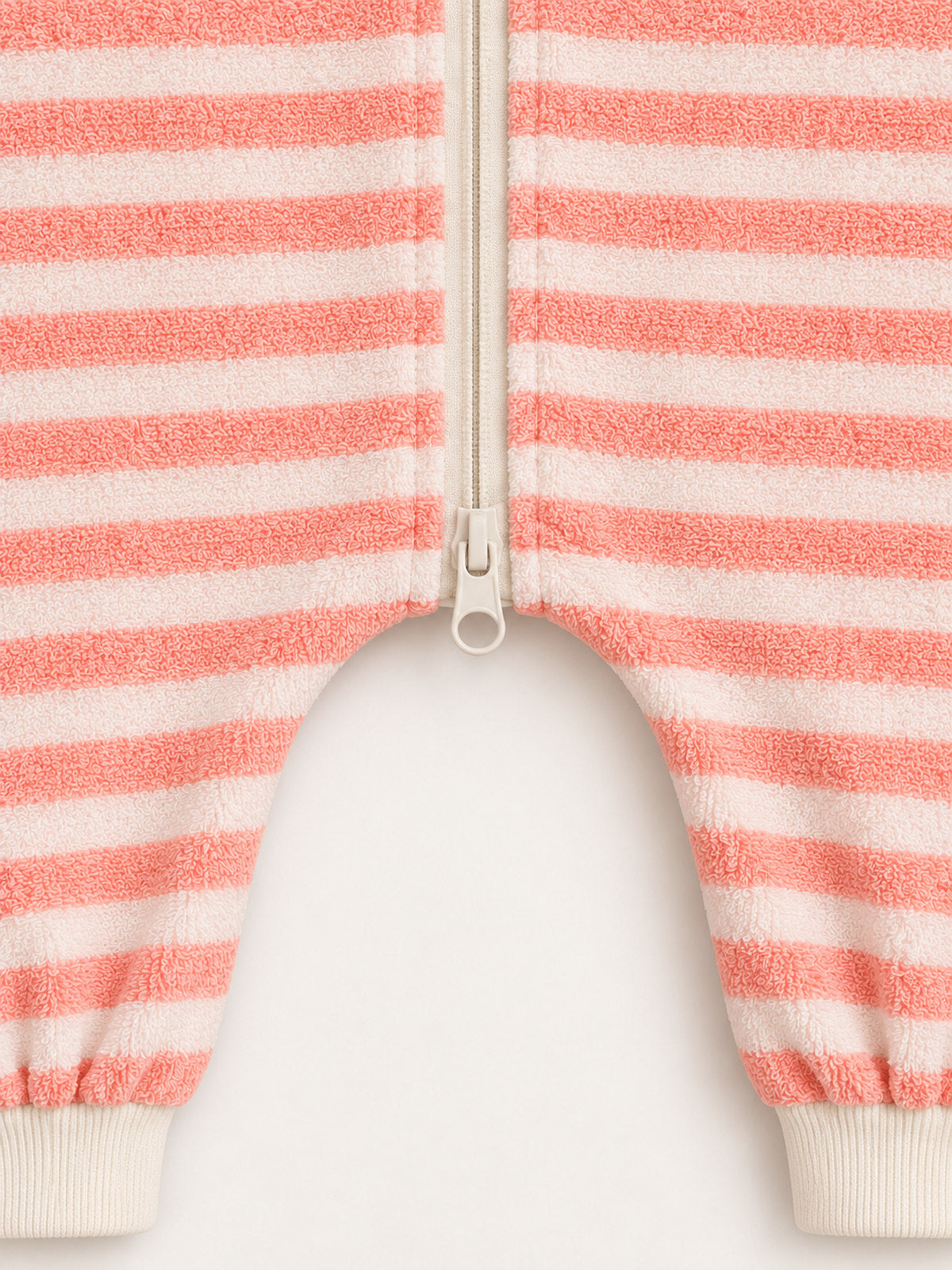 Lower ring-pull zipper and dropped-crotch detail — Coral Pink Stripe Onesie