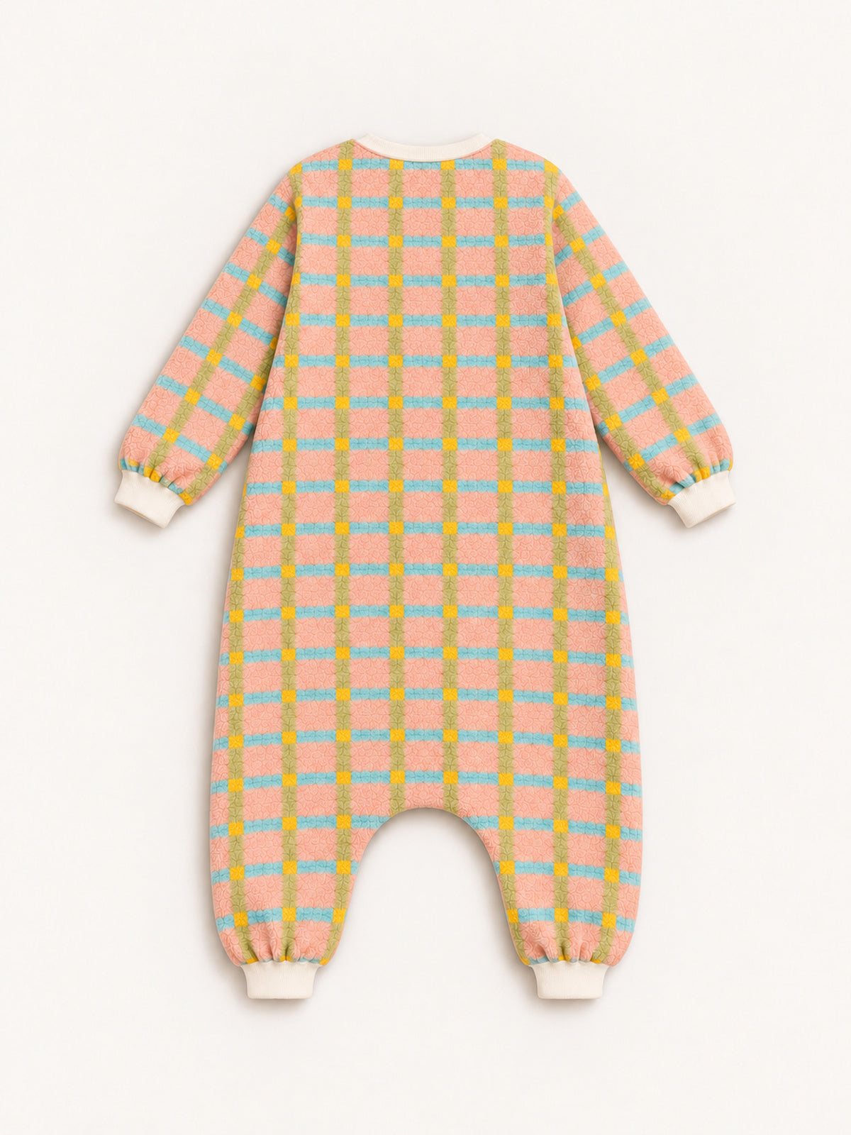 Back view of the pastel plaid onesie with full-length legs and cream ribbed cuffs