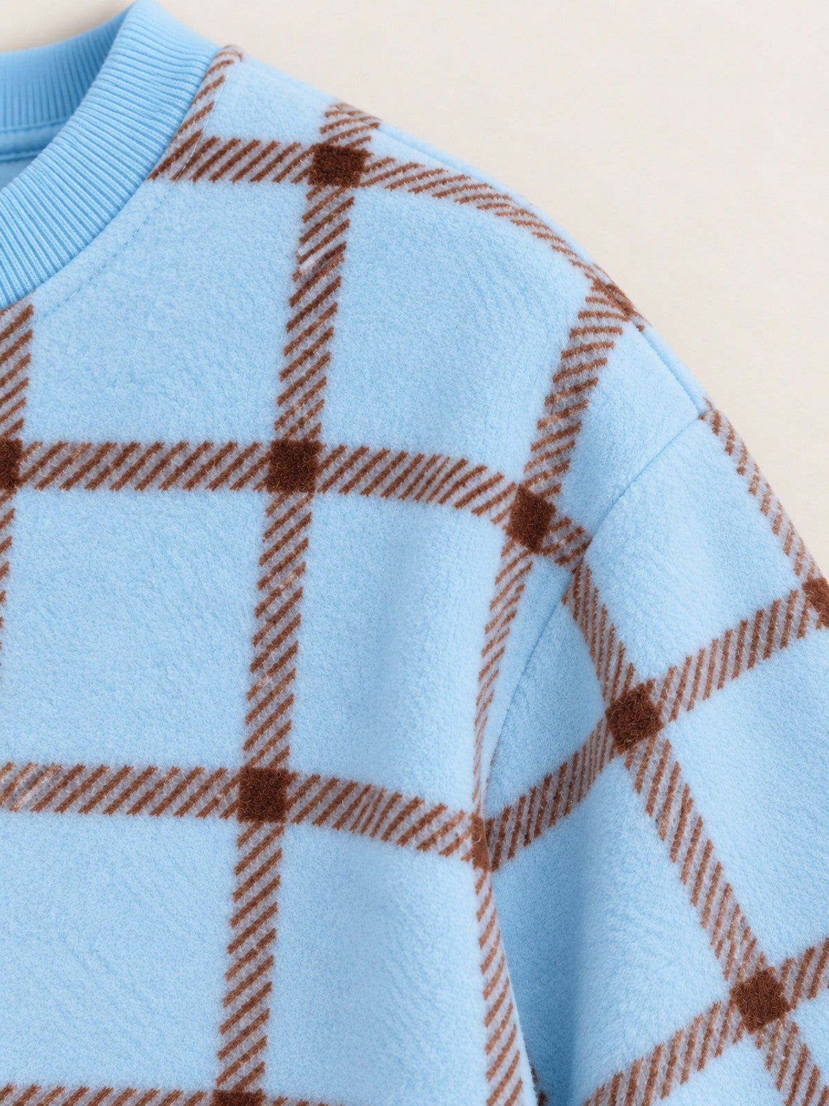 Round neckline and shoulder seam detail — Ice Blue Plaid Onesie