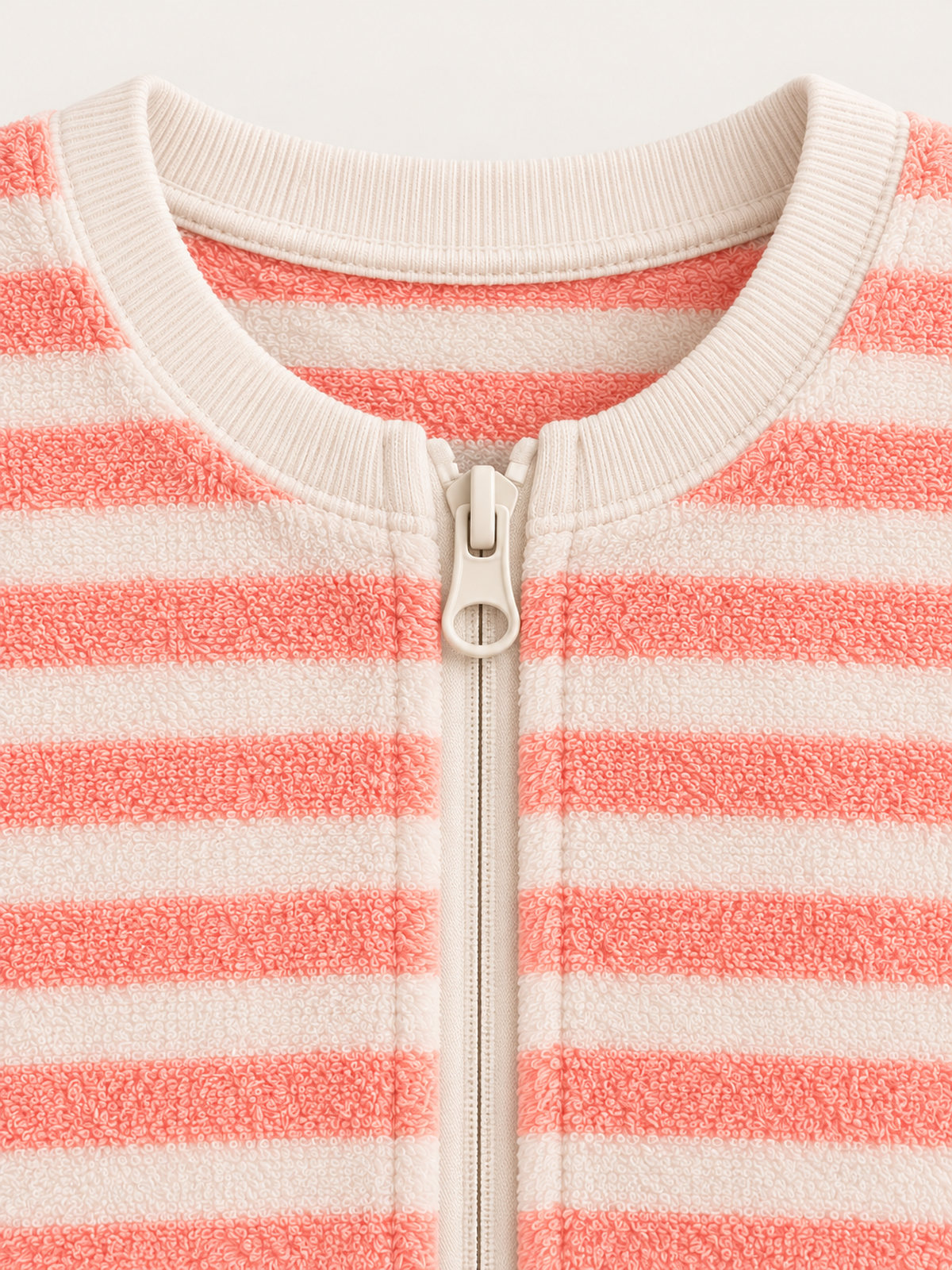 Ribbed round neckline and top ring-pull zipper detail — Coral Pink Stripe Onesie