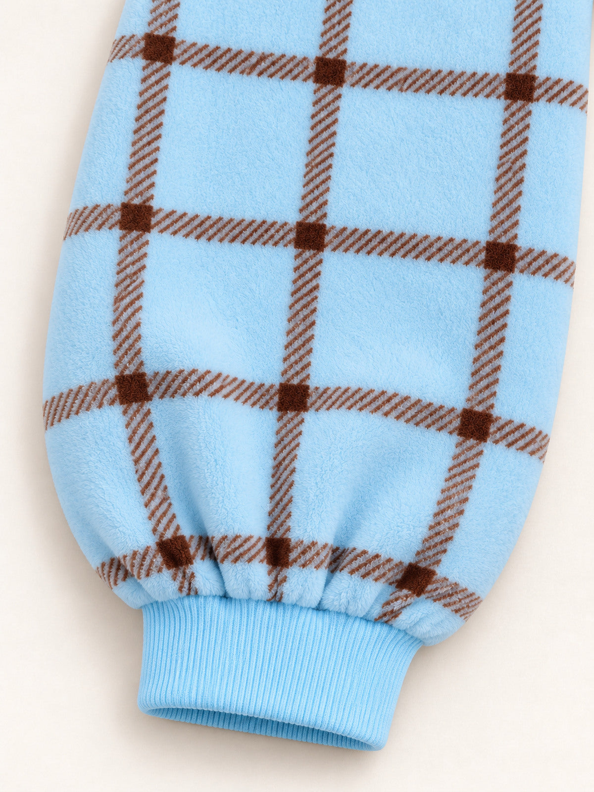 Gathered leg and blue ribbed ankle cuff detail — Ice Blue Plaid Onesie