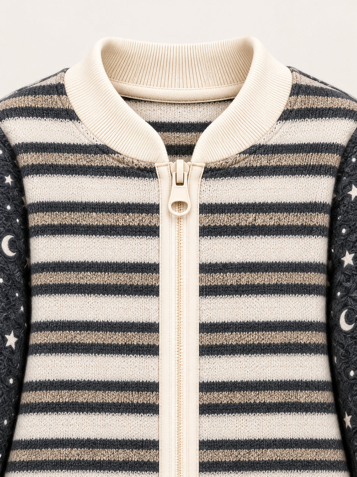 Close-up of the cream ribbed neckline and front zip on the striped adult onesie
