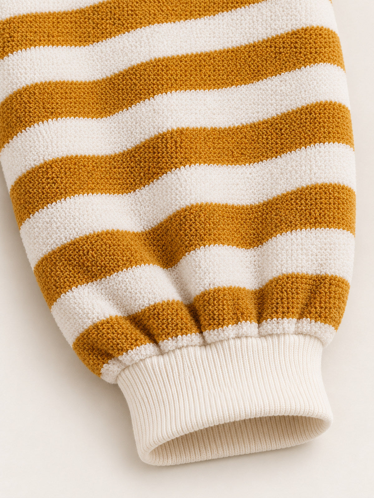 Gathered leg and ribbed ankle cuff detail — Mustard Stripe Onesie